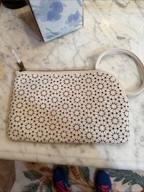 HOBO Cream Laser-Cut Floral Wristlet Clutch
